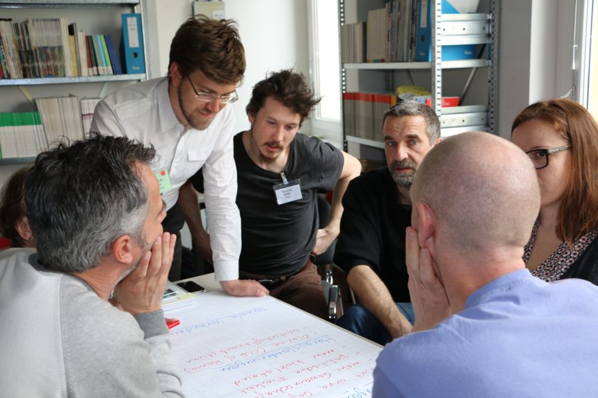 People working together at a table.